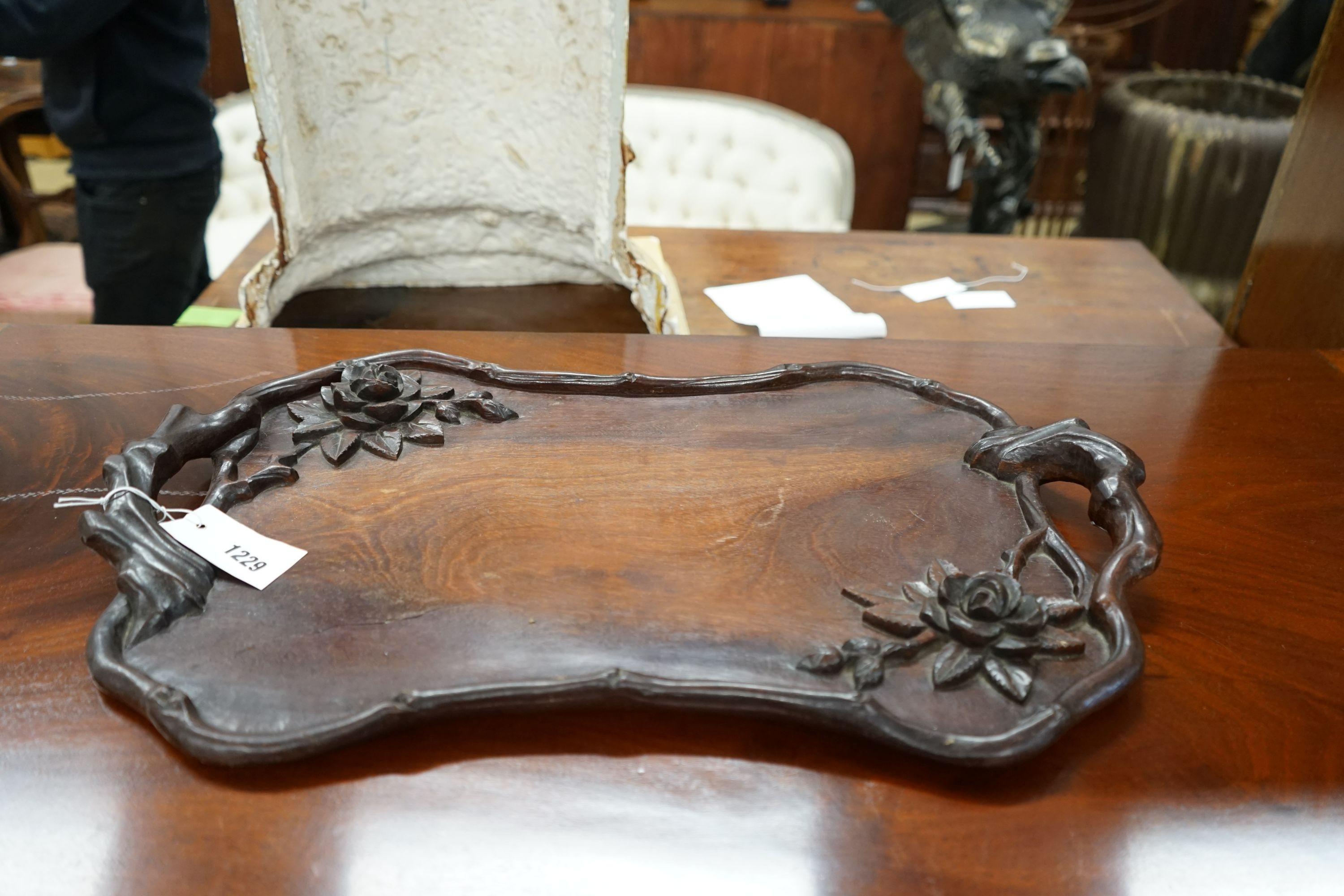A brass bound staved mahogany waste paper bin, width 35cm, height 36cm together with a Chinese carved hardwood tray
